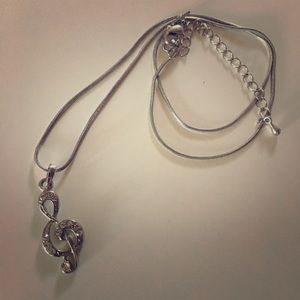 Music clef necklace